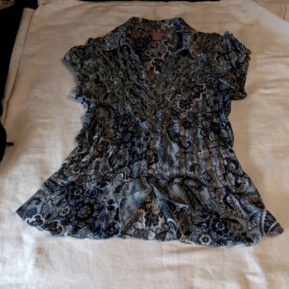 Med.dress shirt, kinda Taylor fit at waist .ruffles on chest button dn in front
